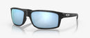 Oakley Gibston Sunglasses - Prizm Deep Water Polarised Lenses with Matte Black Camo Frame