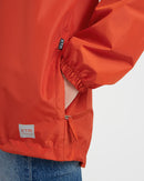 XTM Performance Unisex Stash 2L Packable Rain Jacket - Burnt Orange